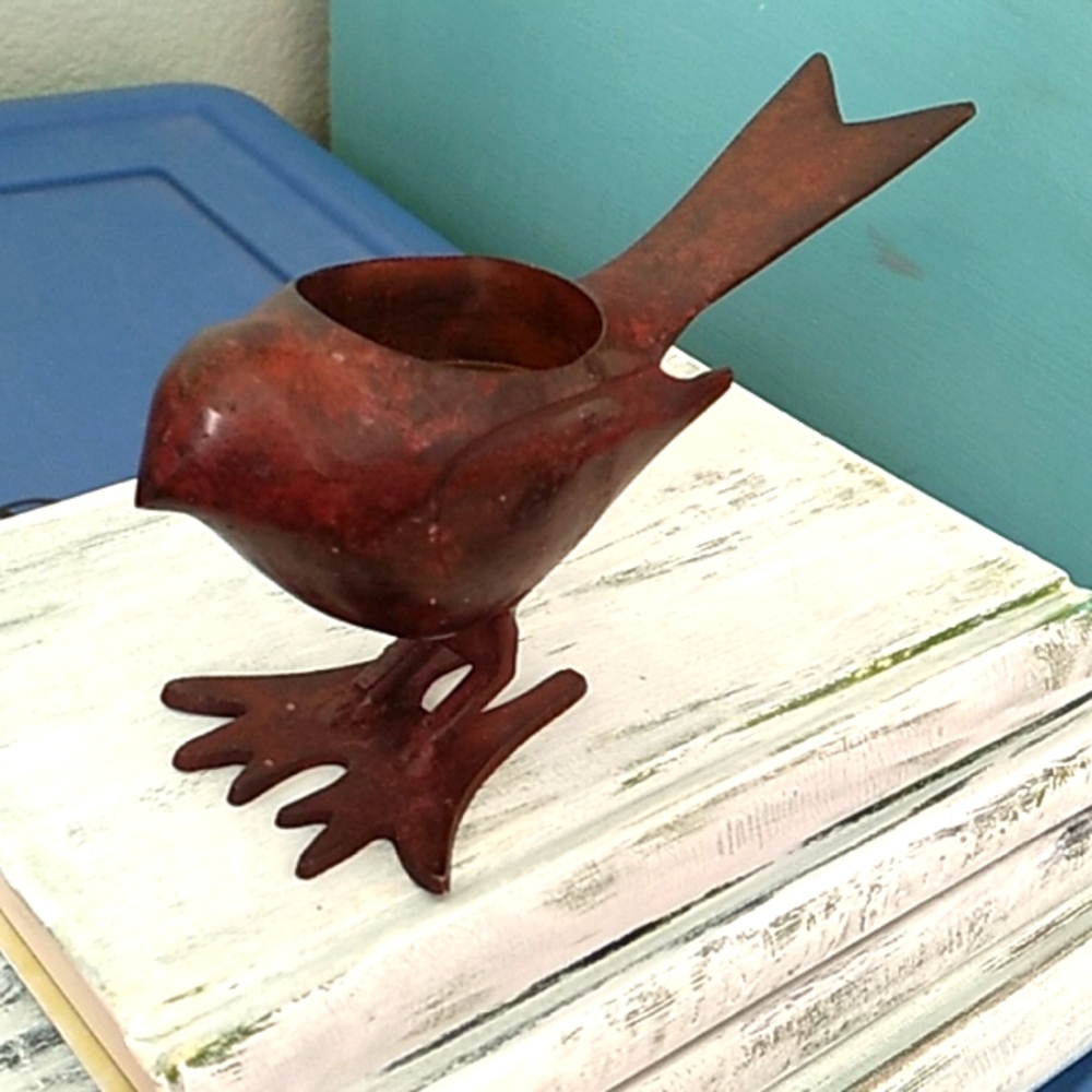 Solid metal bird tea light candle holder statue